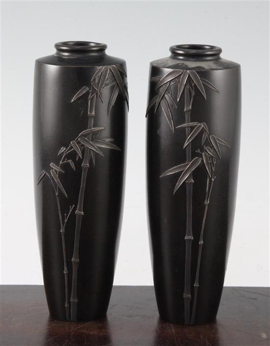 A pair of Japanese bronze and silver overlaid vases, Meiji period, by Hattori, 16.5cm